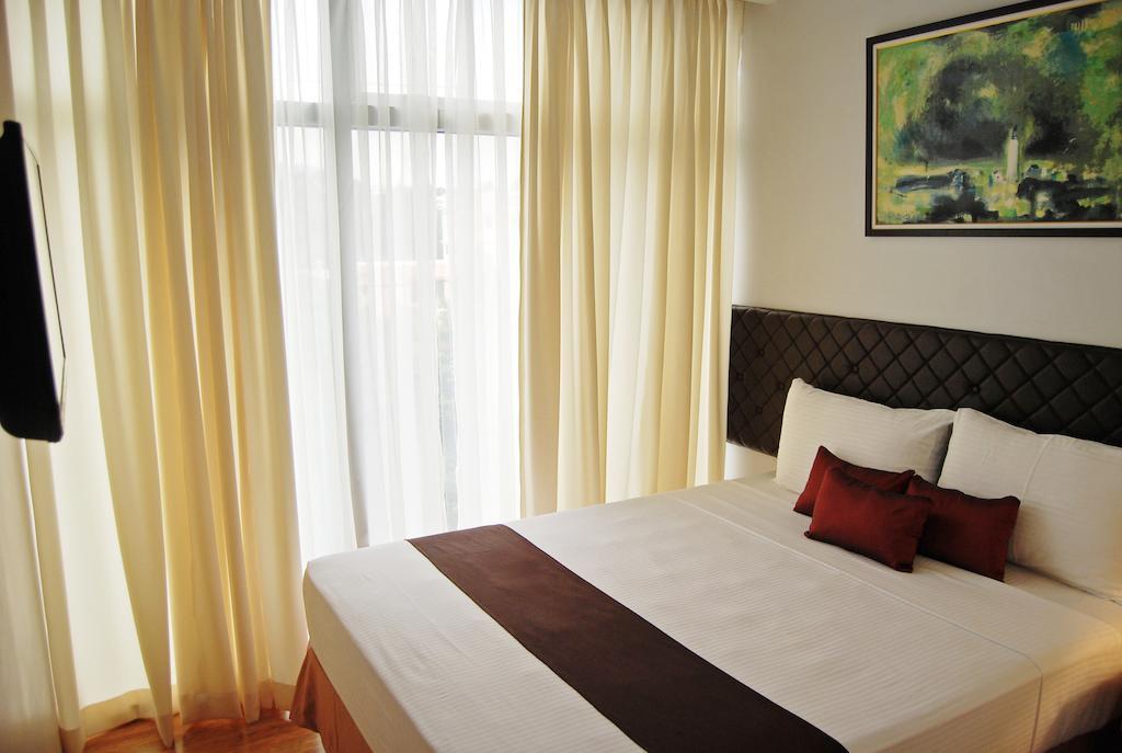 Capitol Central Hotel And Suites Cebu Quarto foto